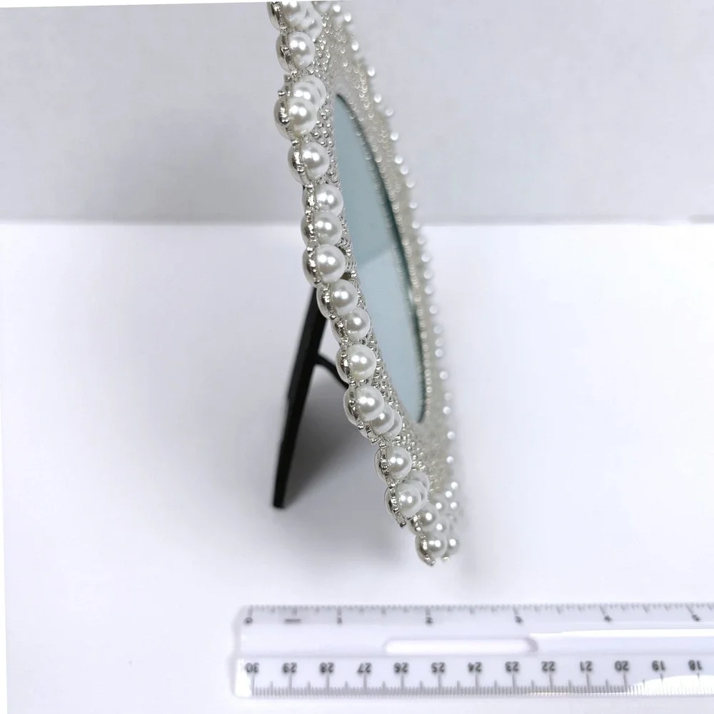 Source Unknown faux pearl